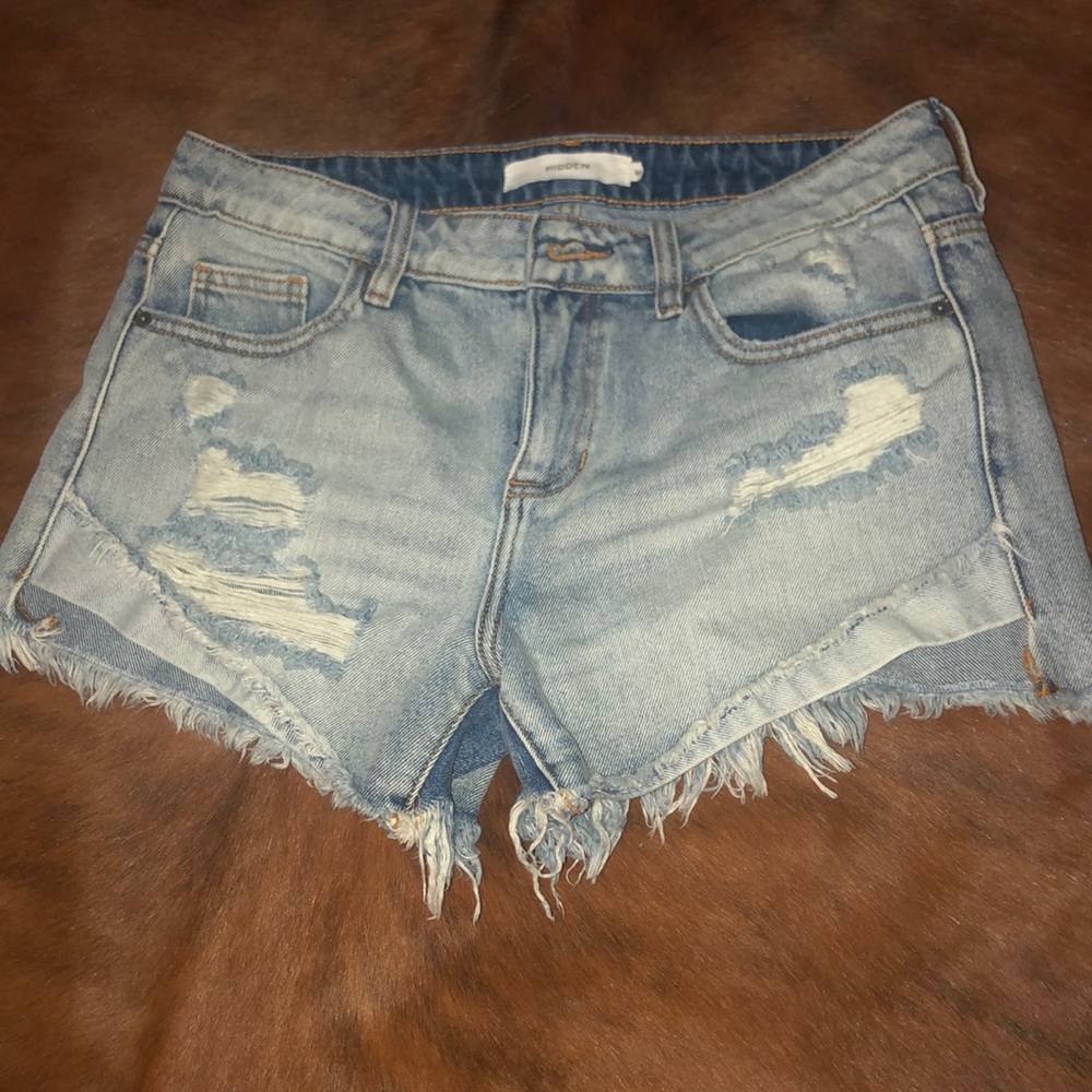 Distressed denim shorts